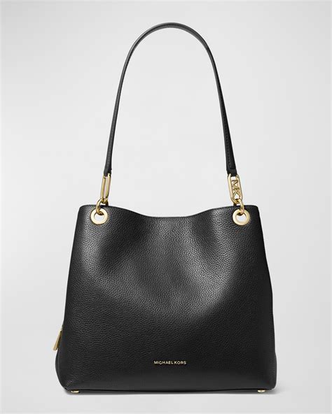 are michael kors bags considered luxury|is Michael Kors expensive.